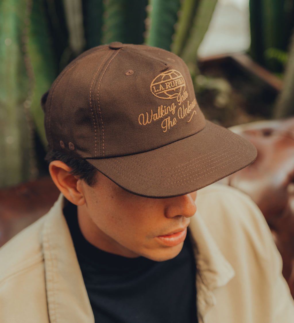 Walking on Brown Hat